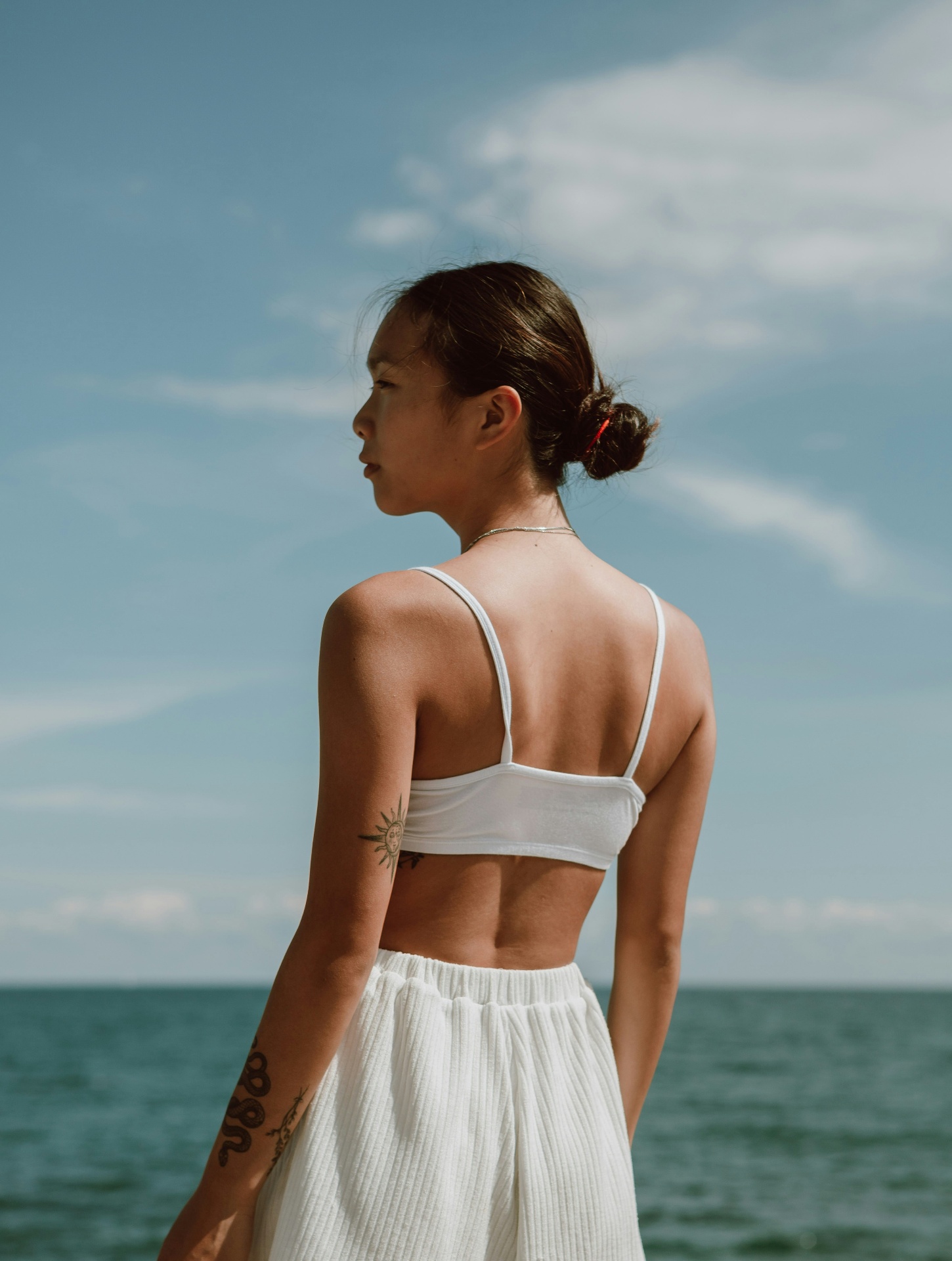 A woman by the sea